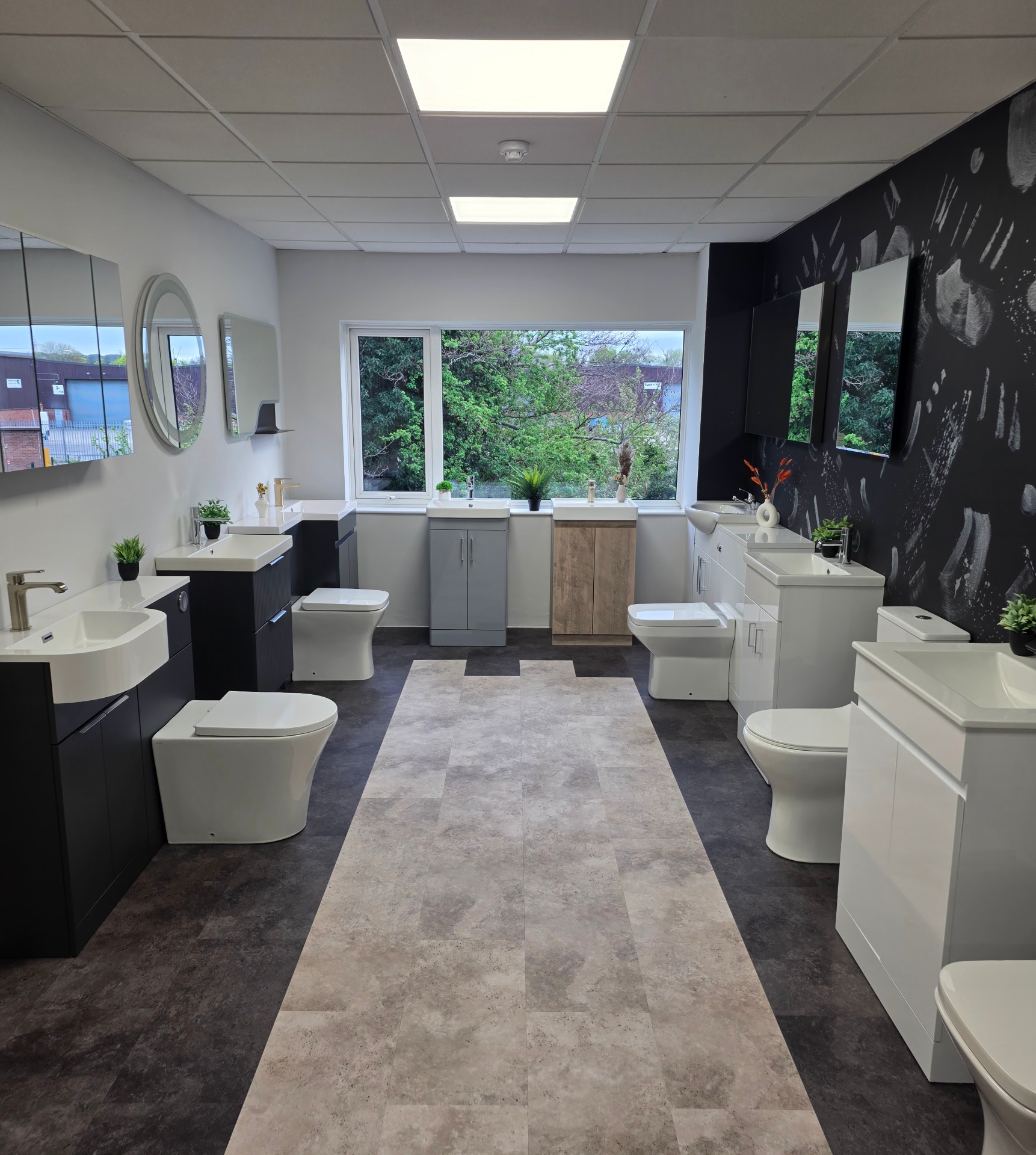 Blue Sky Luxury Bathrooms Tamworth showroom — vanity unit, WC and basin displays under bright lighting
